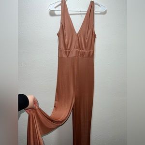 “Champagne”/ “nude” colored iridescent pant style romper.
